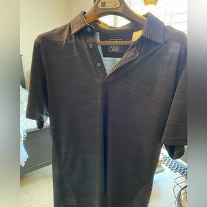 Puma golf shirt, black with grey stripes. Perforated for cooling. Nice shirt!